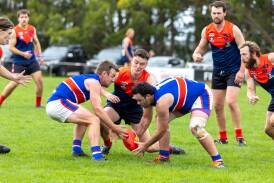 Panmure skipper Tyler Murnane (left) competes for a ground ball against Timboon Demons. Picture by Eddie Guerrero