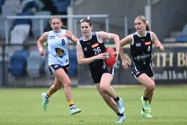 Olivia Wolter bursts away with the footy against Bendigo Pioneers. Picture by Kate Healy