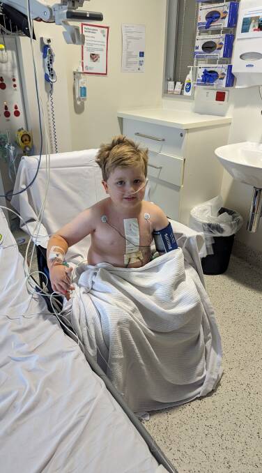 The first time Xavier sat up out of bed after surgery. Picture supplied