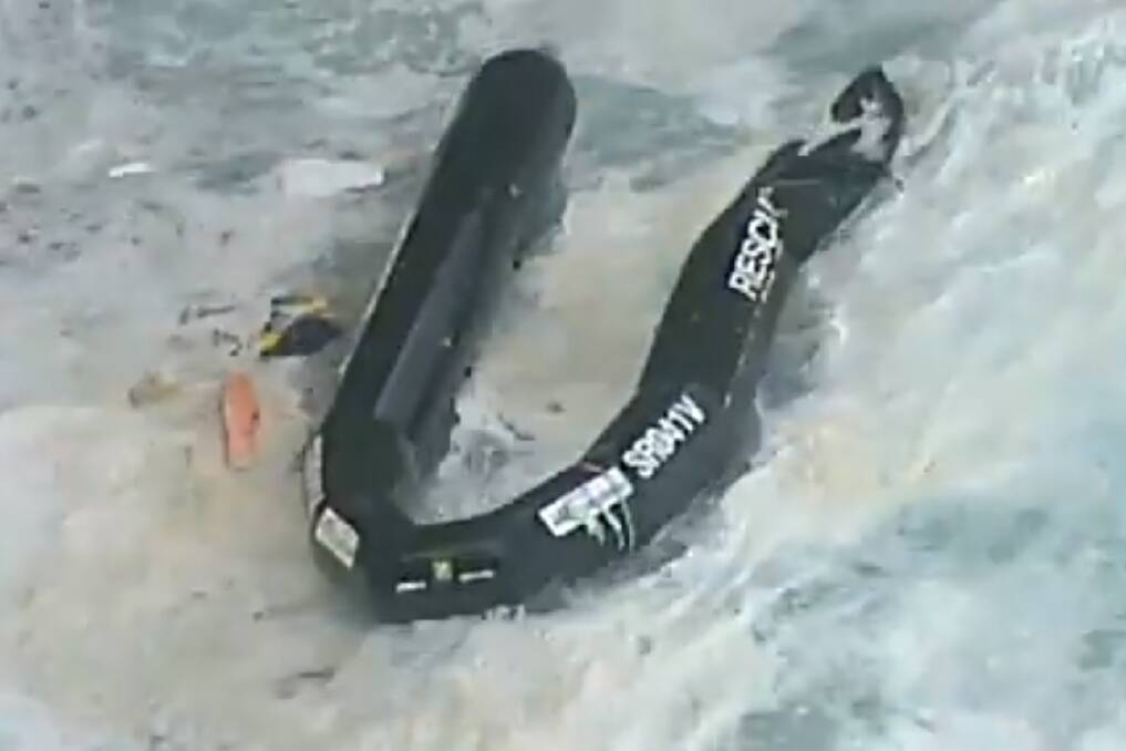 SHATTERED: The remains of the capsized rescue vessel near Port Campbell on Sunday. Picture: Nine News