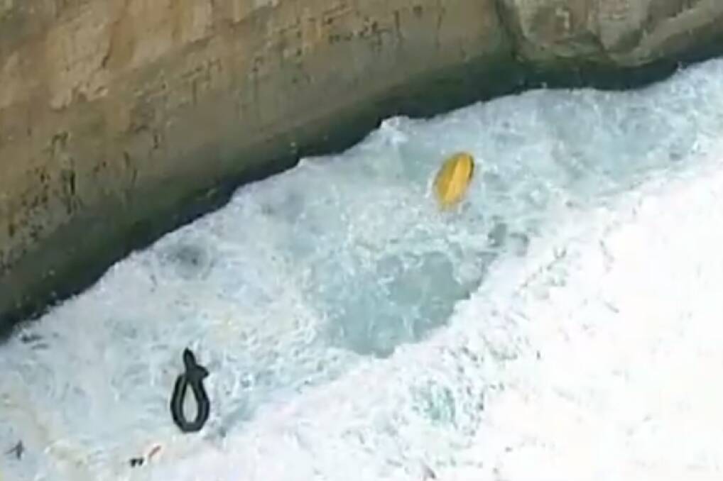 WRECKAGE: The remains of the capsized rescue vessel near Port Campbell on Sunday. Picture: Nine News