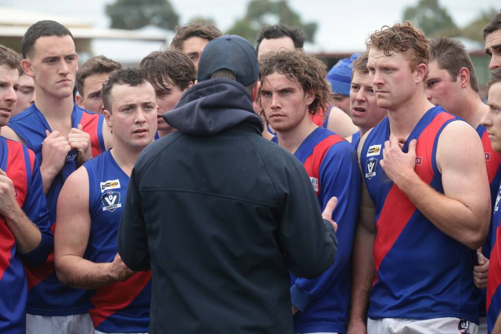 Terang Mortlake coach Ben Kenna addresses his players at quarter-time. Picture by Sean McKenna