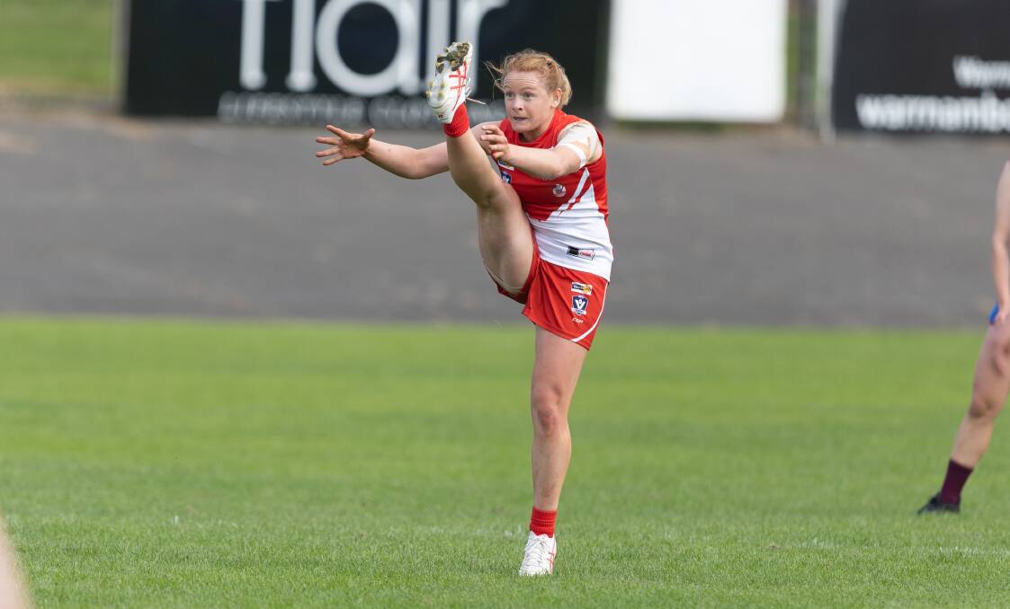 Jane McMeel launches a shot towards goal for the Roosters this season. Picture by Eddie Guerrero