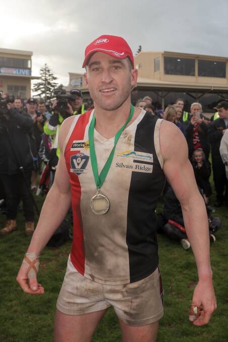 Koroit's Tim McIntyre celebrates after receiving the Ron Hoy medal for best on ground in the 2017 grand final. File picture