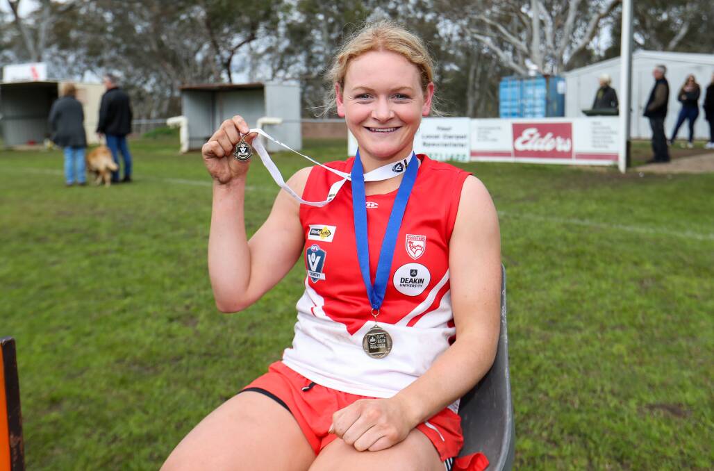 Jane McMeel after breaking her leg and winning the best-on-ground medal in the 2018 grand final which the Roosters won. File picture