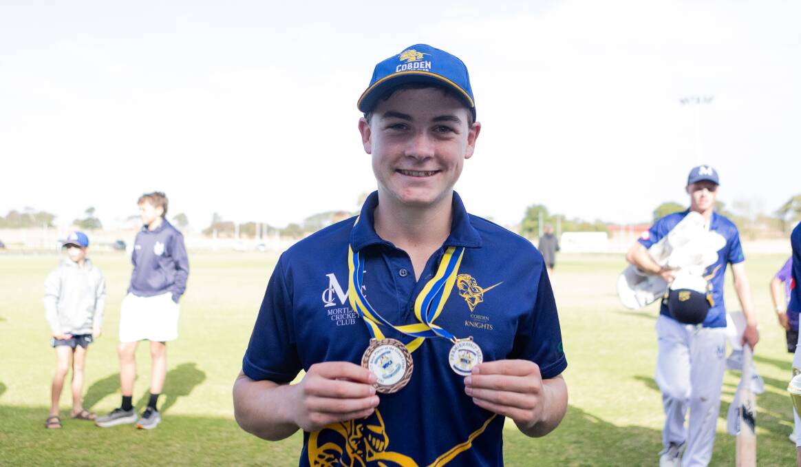 Parker Walsh with his man-of-the-match and premiership medals. Picture by Anthony Brady