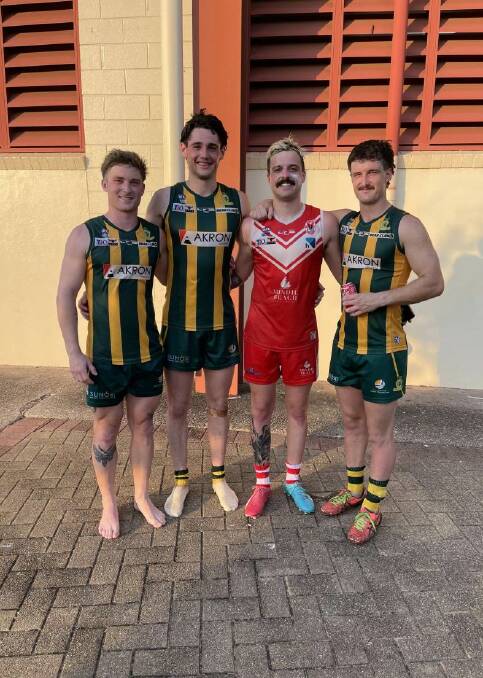 South-west footballers Luke McConnell, Jacob Moloney, Louis Kew and Brad Gedye pose after facing off in an NTFL game. Picture supplied