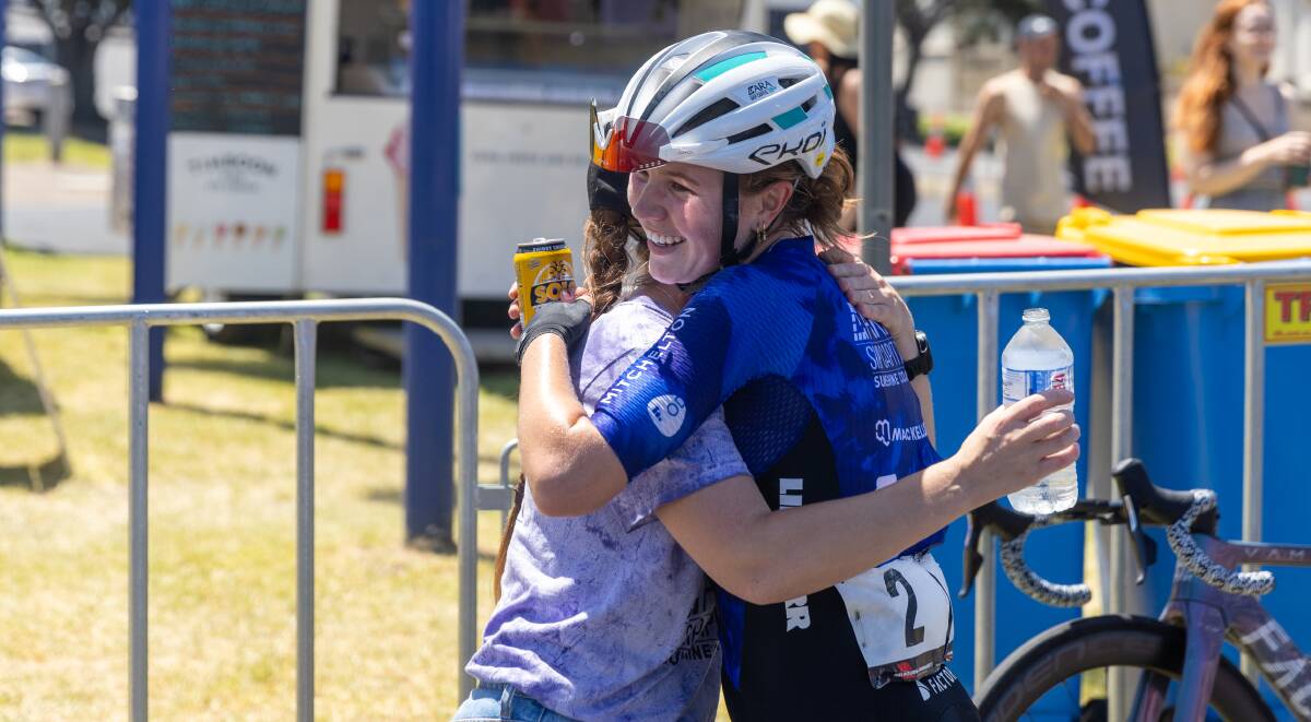 Lucie Stewart embraces another rider after her win. Picture by Eddie Guerrero