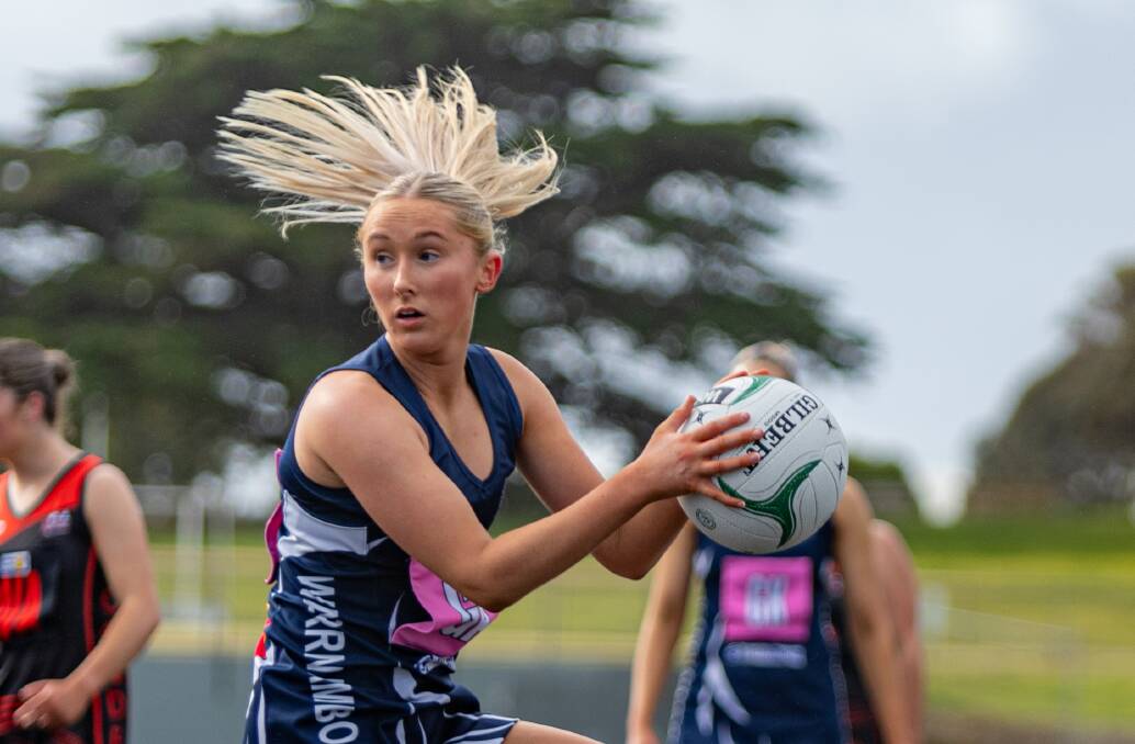 Warrnambool's Isabella Baker looks to pass the ball during her 100th Hampden league open game on Saturday. Picture by Eddie Guerrero