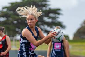 Warrnambool's Isabella Baker looks to pass the ball during her 100th Hampden league open game on Saturday. Picture by Eddie Guerrero