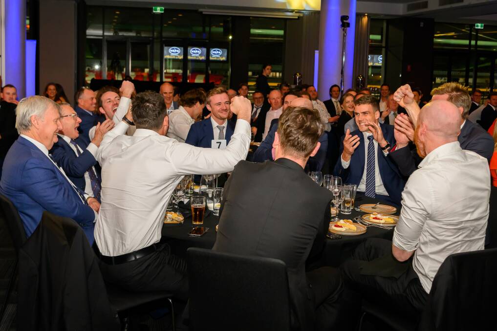 Marty Gleeson's clubmates celebrate after he tops the Woodrow Medal count. Picture by VAFA Media