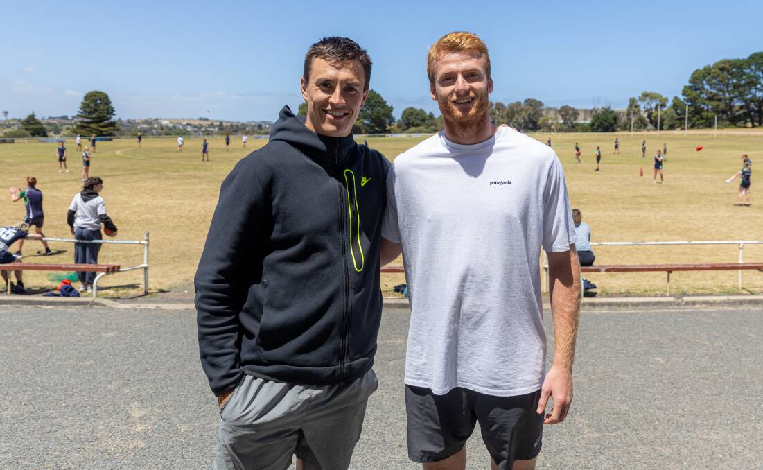 Willem Drew with Brisbane Lions midfielder and South Warrnambool export Hugh McCluggage at a Warrnambool College football clinic in November 2023. Picture by Eddie Guerrero