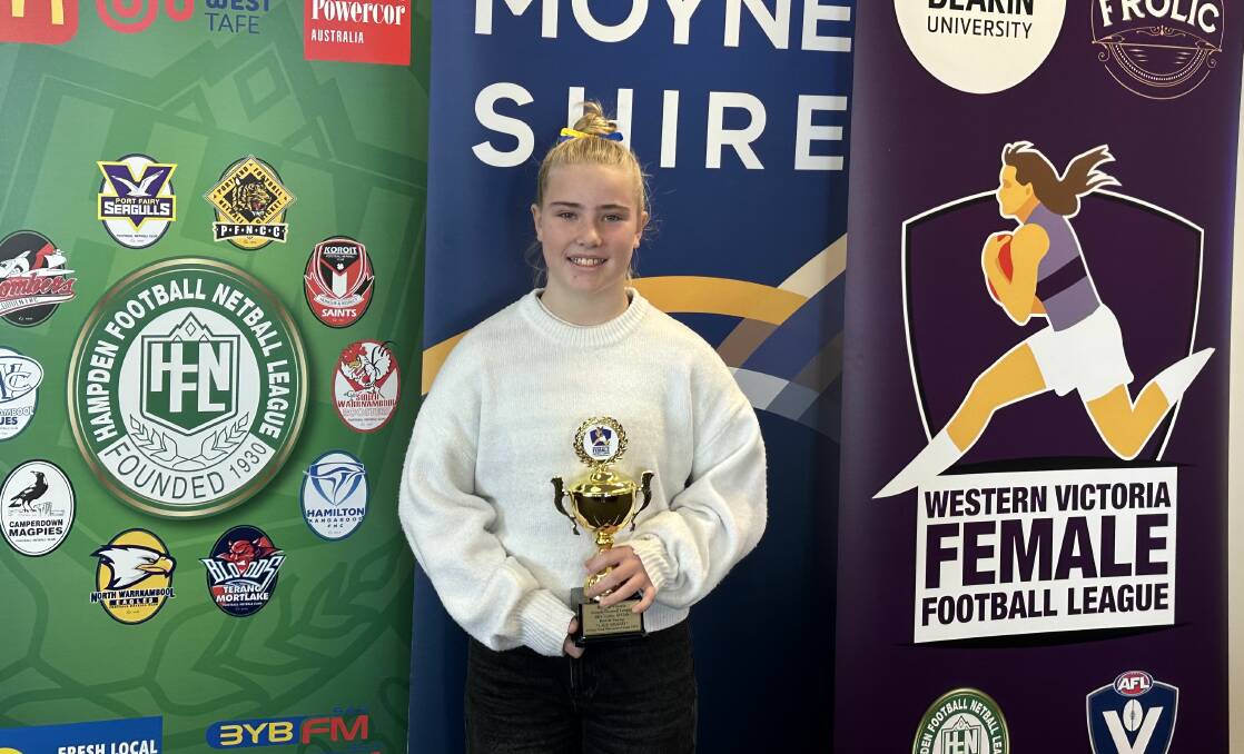 North Warrnambool Eagles footballer Lily Shand with her WVFFL under 15 league best-and-fairest trophy. Picture supplied