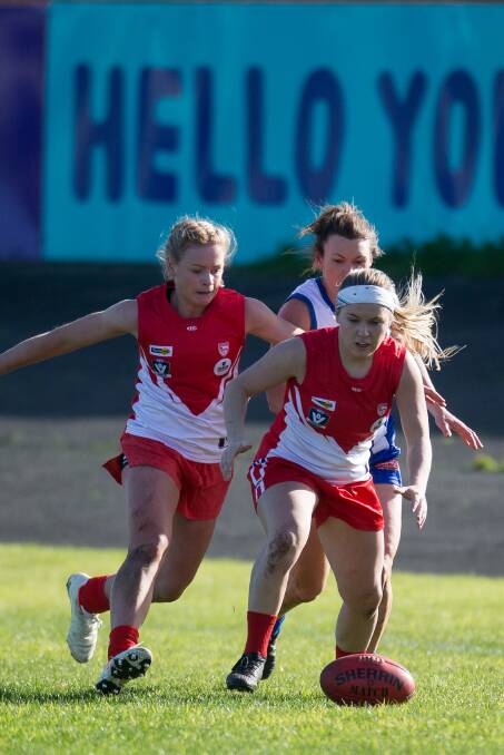 Lauren McConville and teammate Geelong VFLW player Jane McMeel (left) were teammates at South Warrnambool in 2019. Picture by Anthony Brady