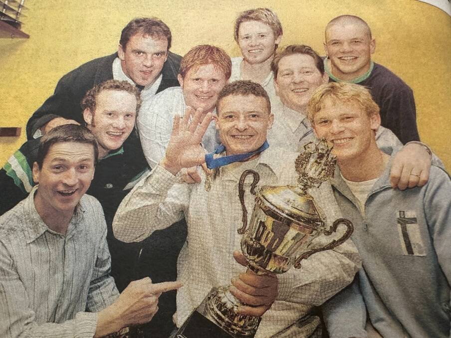 Nick Hider celebrates with his Warrnambool Blues teammates after winning the 2003 Maskell Medal. Picture file