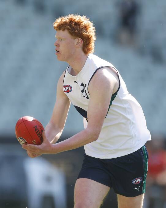 Cobden's Flynn Penry rucked well for Team Selwood in the under 17 futures match before the AFL grand final at the MCG. Picture by Getty Images