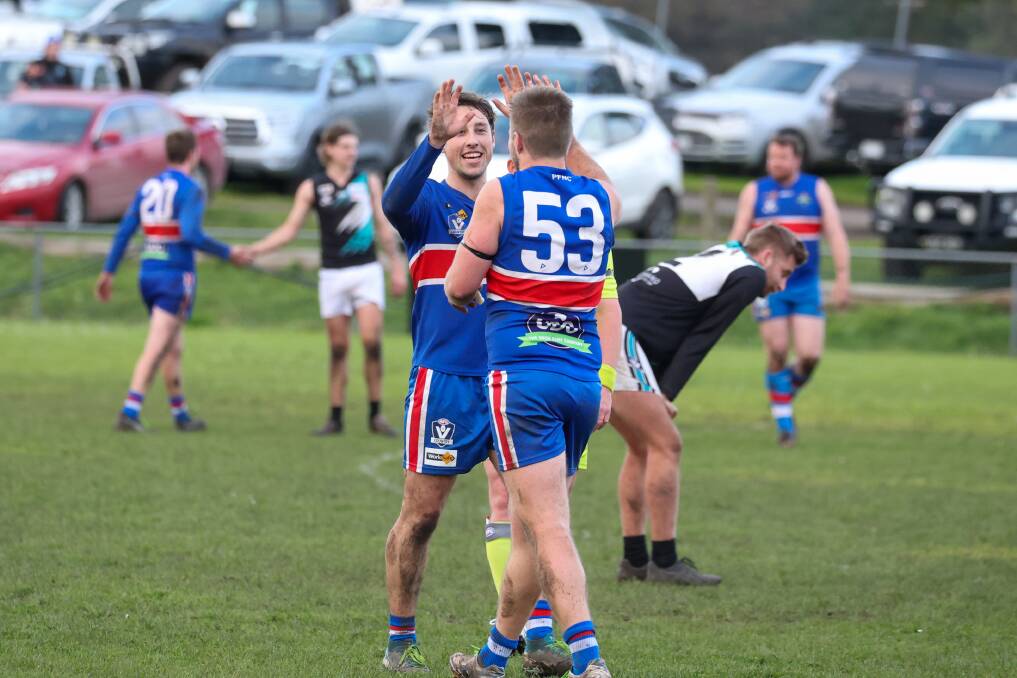 Lachlan McLeod and James Norton celebrate a goal for Panmure. Picture by Eddie Guerrero
