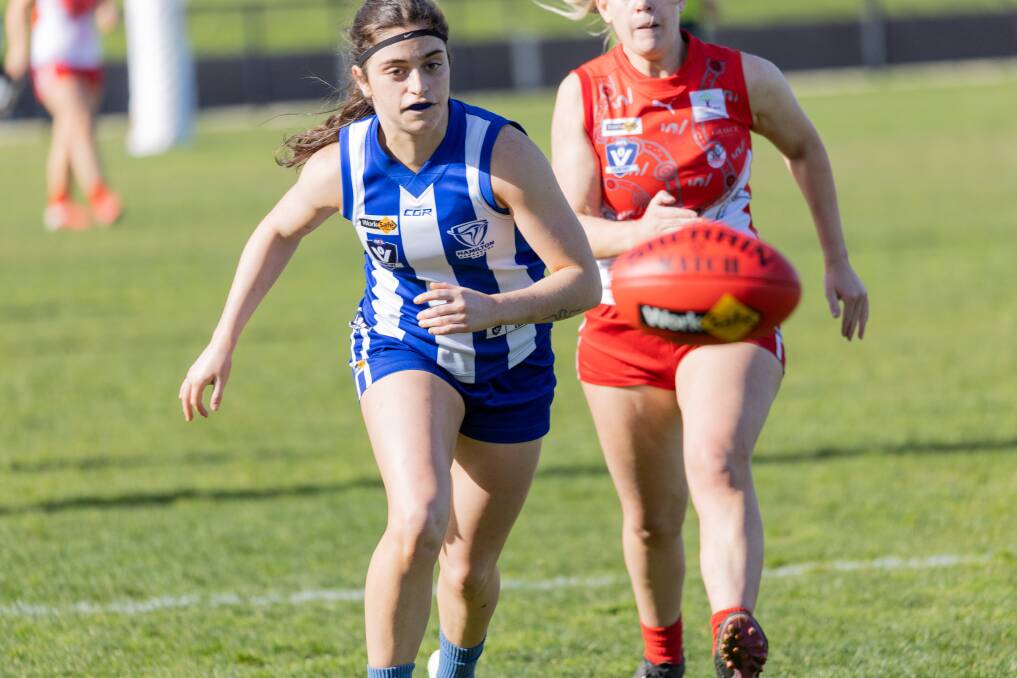 Kangaroos skipper Emily Pitts chases down a loose ball. Picture by Anthony Brady