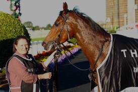 Strapper Kelly Harry with Stefi Magnetica after a win in a $3 million race at Eagle Farm.