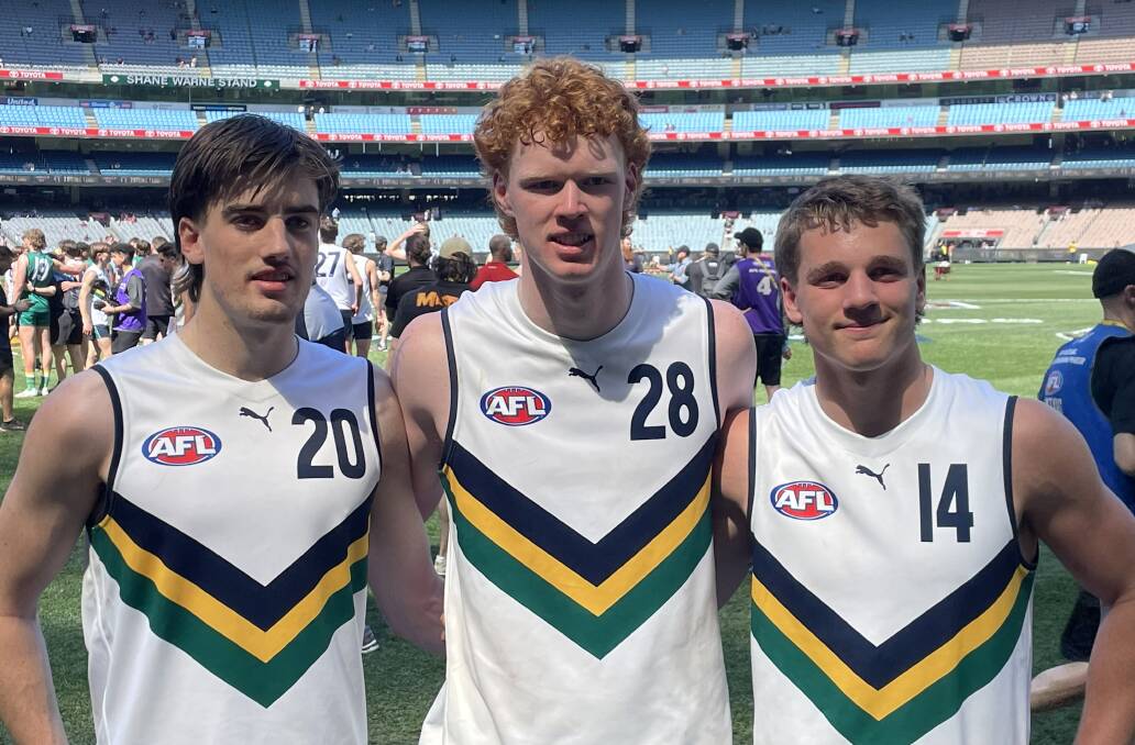 Cobden's Flynn Penry (centre) alongside Team Selwood teammates Jonty Faull (left) and Sam Lalor (right) at the MCG. Picture supplied