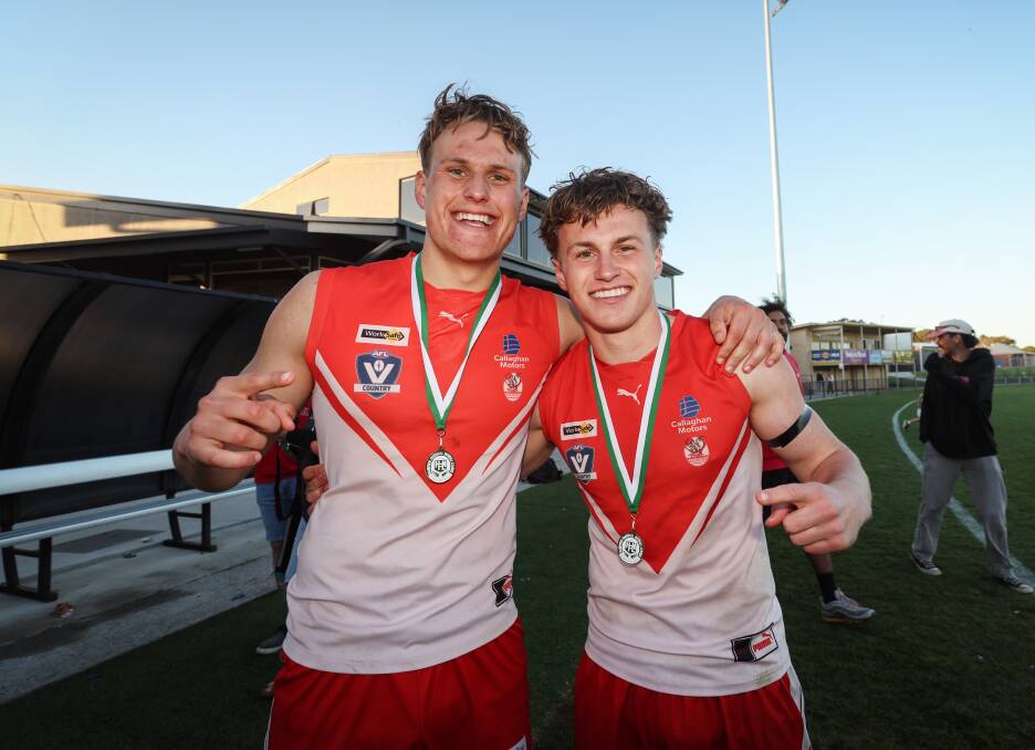 Brothers George and Archie Stevens celebrate after winning a flag with South Warrnambool in 2023. Picture by Sean McKenna