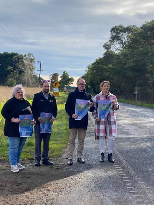 Simpson Community House's Deb Smith, David Costin, Polwarth MP Richard Riordan and Corangamite Shire mayor Kate Makin at the launch of a petition calling for an urgent fix to the surface of the road. Picture supplied