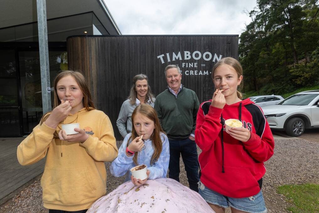 Timboon Fine Ice Cream owners Caroline Simmons and Tim Marwood stand with visitors from South Australia, Amaya (12), Essie (10) and Ivy (13). Picture by Eddie Guerrero.
