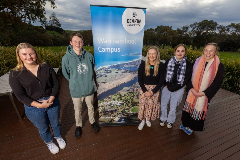 Year 12 students Sophie Kelly, Harry McGorm and occupational therapist lecturer Lucinda Watson stand with fellow students Gabby Hose and Lilly Carey who hope to study at Deakin University's Warrnambool Campus. Picture by Eddie Guerrero