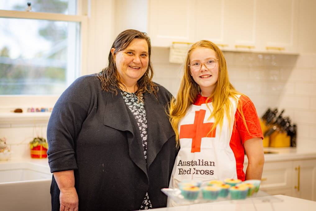 Cassie's mum, Meredith, said her daughter had been helping for years before officially becoming a member of the Red Cross. Picture by Eddie Guerrero.