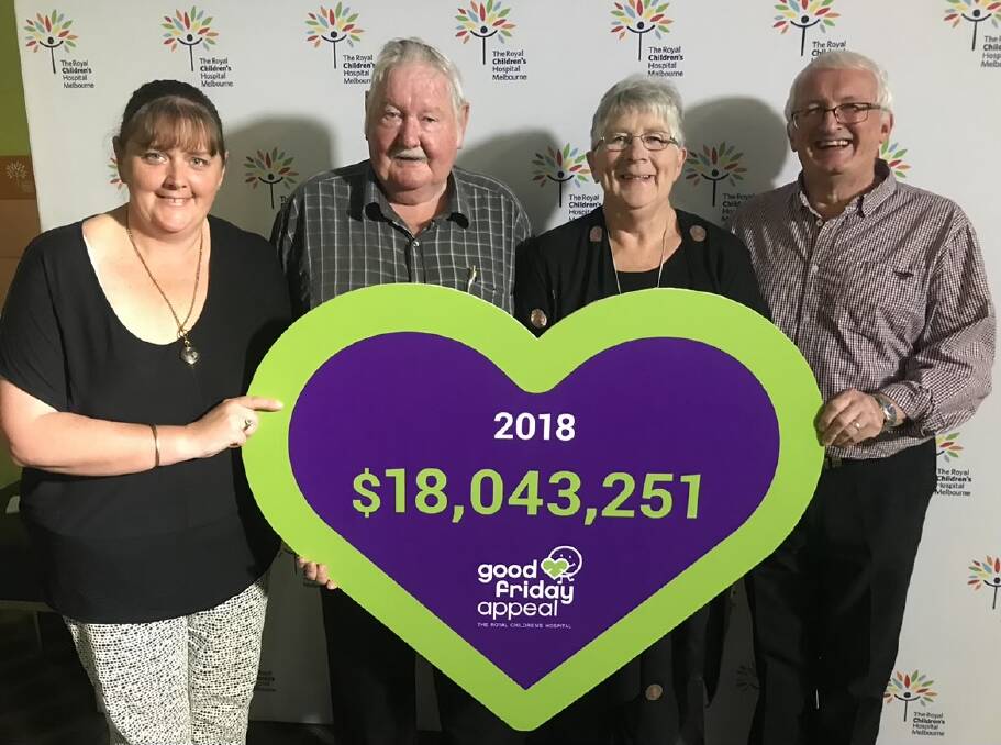 APPEAL: The Fleming's (centre) with the 2018 Good Friday Appeal total.