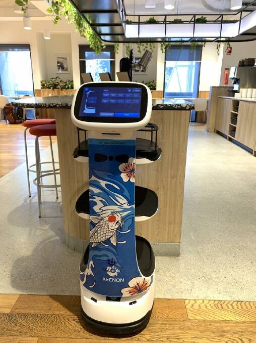 Pictured is SoftBank's waiter robot that could be used in hospitality venues.