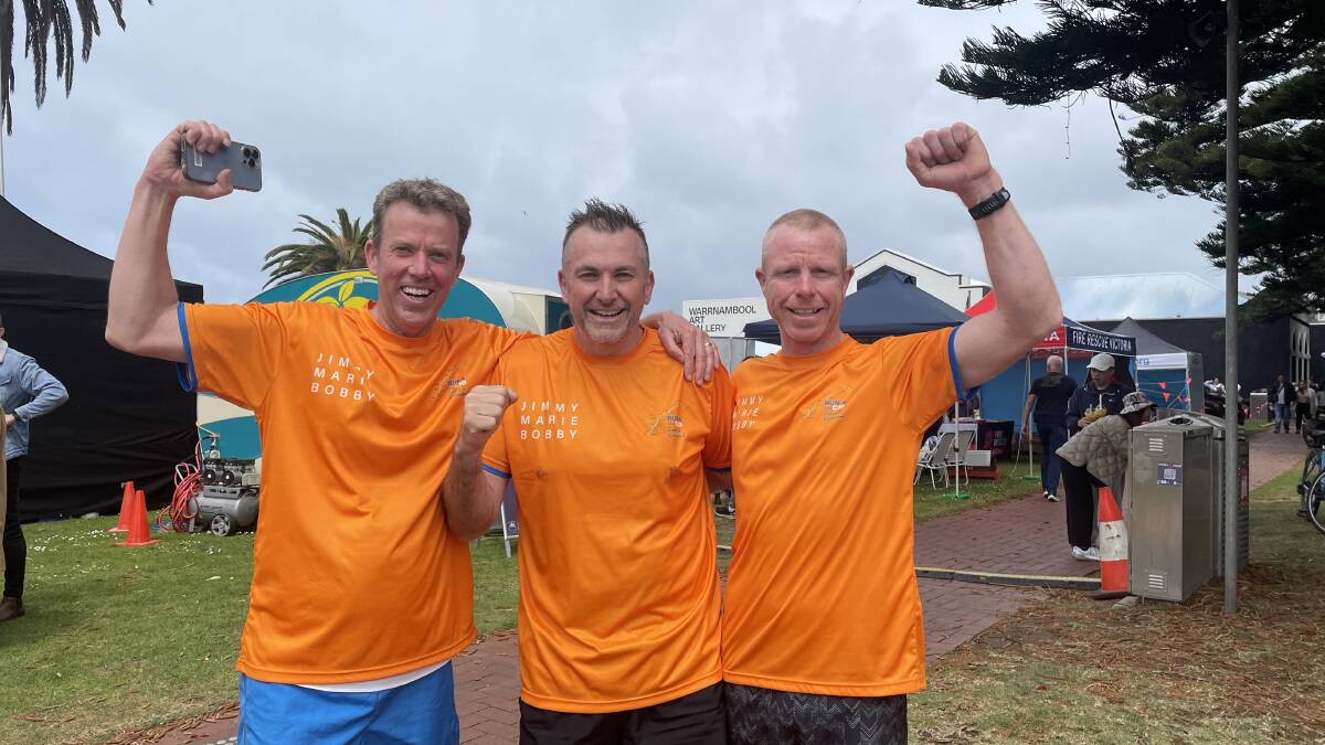 Dan Tehan, Matty Stewart and James Kenna at the Civic Green where they ended their seven-and-half day run from Canberra on Saturday, October 14. Picture by Lillian Altman