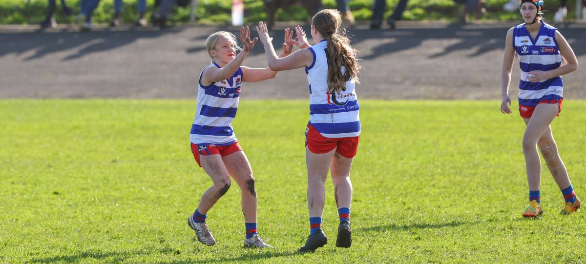 Terang Mortlake's Tayla Bell celebrates a goal with a teammate in Sunday's elimination final win against Warrnambool. Picture by Eddie Guerrero