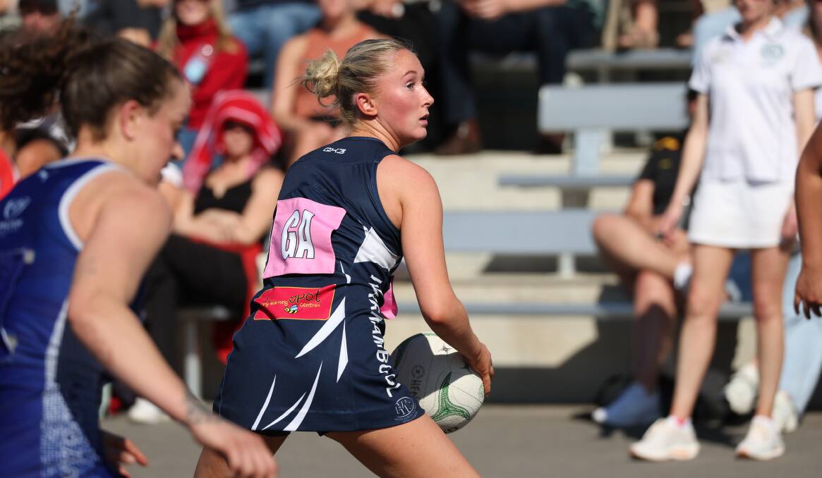 Warrnambool's Isabella Baker keeps the ball moving in attack in Sunday's elimination final against Hamilton. Picture by Sean McKenna