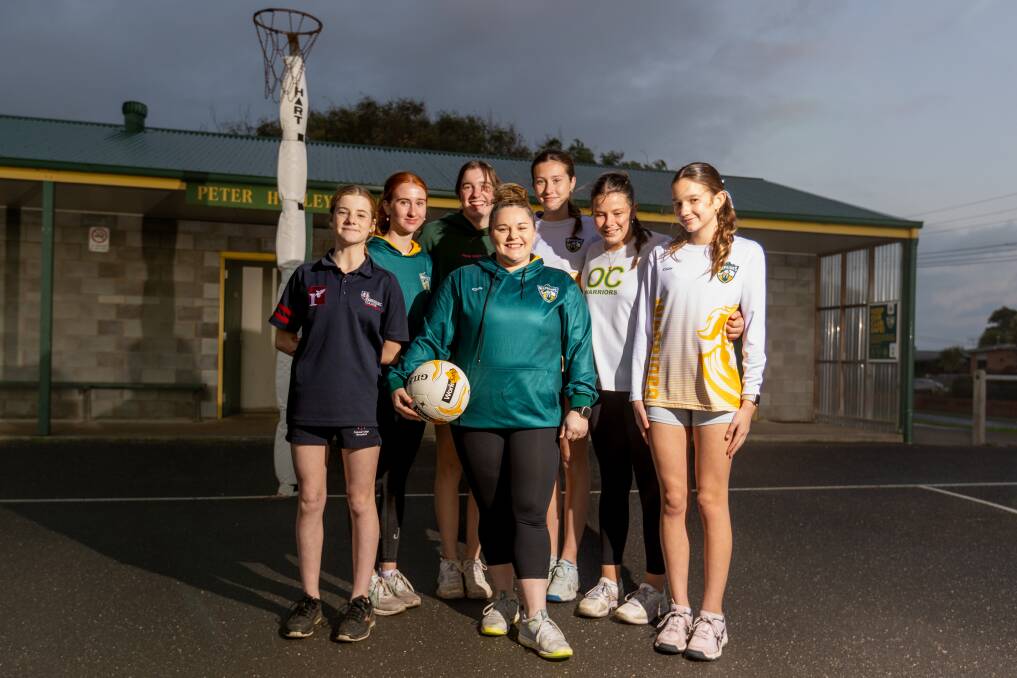 Tamara Bull (middle) pictured with her 15 and under team (L-R) Grace Corbett, 14, Kira OShannassy, 15, Olivia Lenehan, 15, Ruby McKinley, 14, Lexi Forbes, 14 and Ginger Butters, 13, ahead of her 300th senior appearance on Saturday. Picture by Eddie Guerrero.