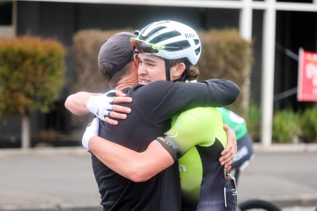 Bailey McDonald embraces his father Deiter after finishing third in the Melbourne to Warrnambool. Picture by Anthony Brady