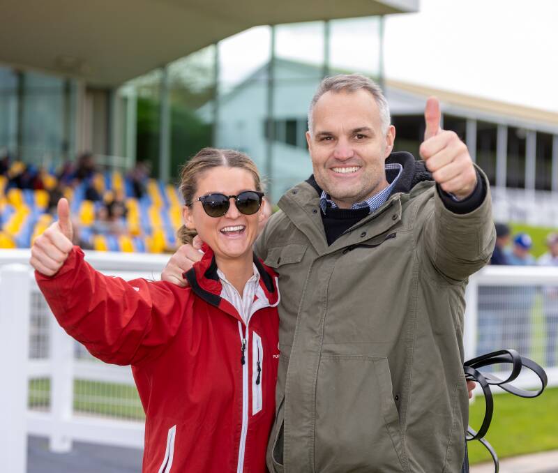 Stawell trainer Andrew Bobin (right) celebrates Bell Ex One's win in the Lafferty Hurdle with niece and strapper Zoe McGregor. Pictures by Eddie Guerrero