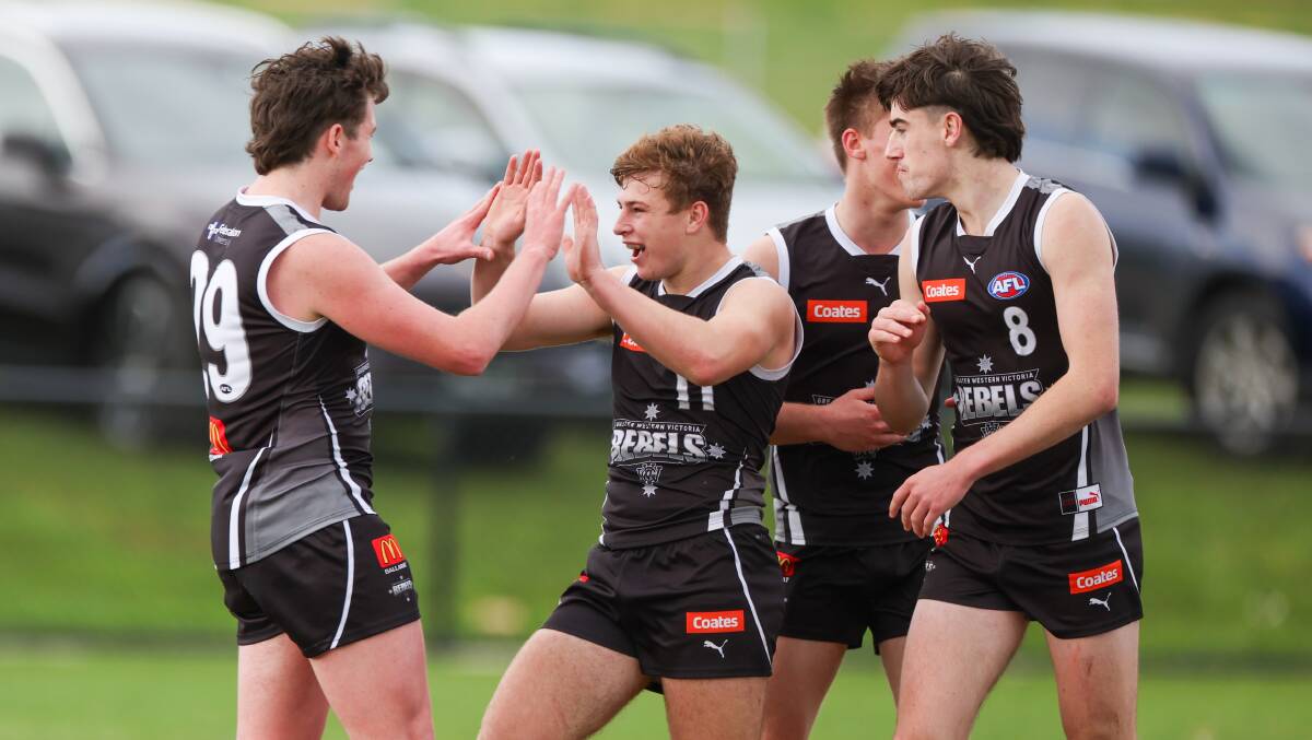 Koroit Saints' Connor Byrne (middle) was a standout for the GWV Rebels, kicking five goals in the win. Picture by Eddie Guerrero