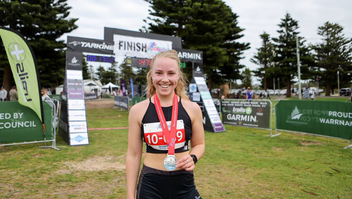 Ballarat's Ebony Howes is all smiles after winning the 10km race event on Sunday.