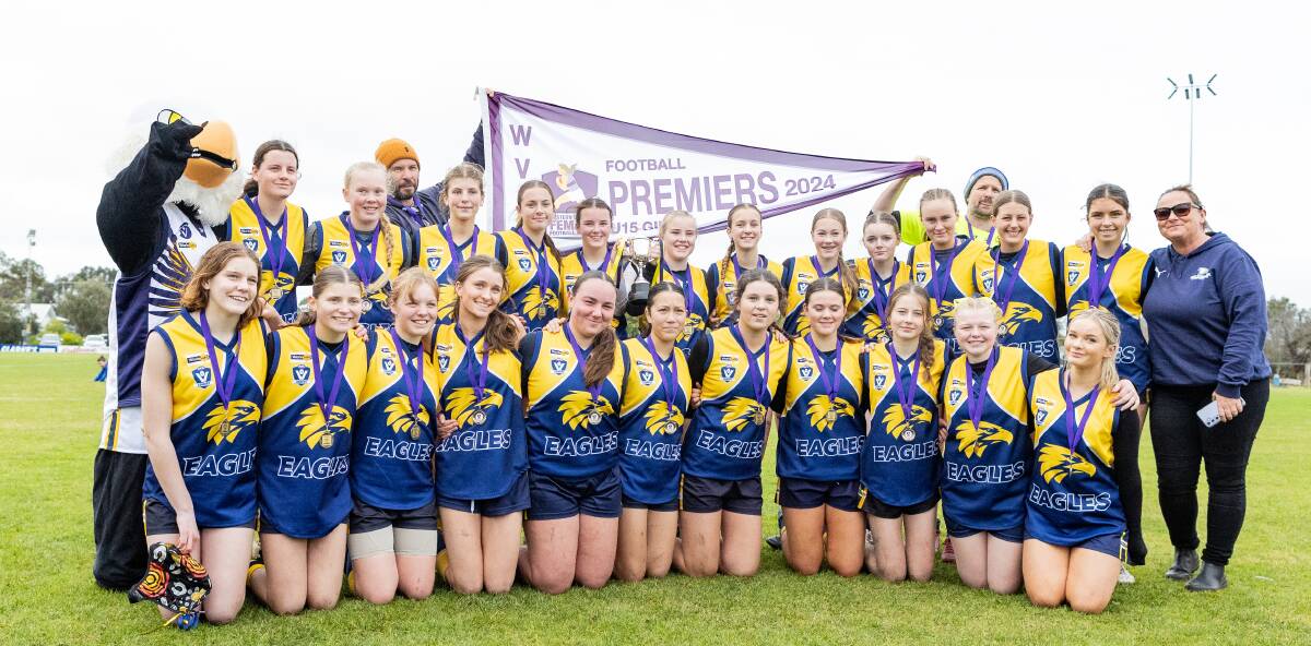 North Warrnambool under 15 girls team celebrates its grand final win on Sunday. Pictures by Anthony Brady