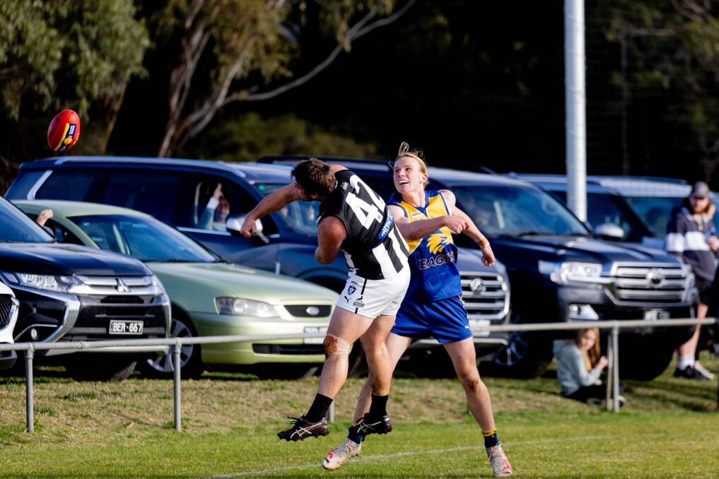 Luke O'Neil, pictured spoiling the ball against North Warrnambool, will play his 100th game in the number 42.