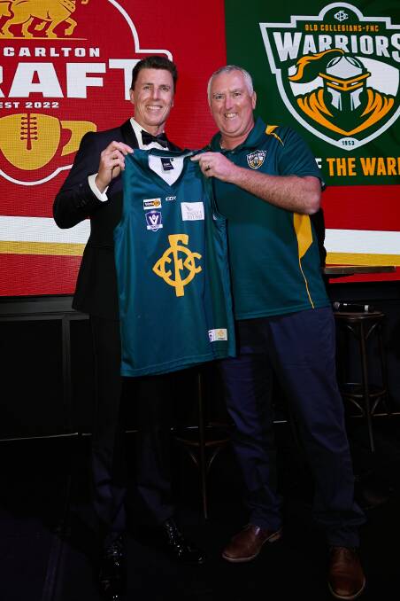 Old Collegians president Simon Dawson (right) presents the jumper to Matthew Lloyd on Carlton Draft night. Pictures supplied
