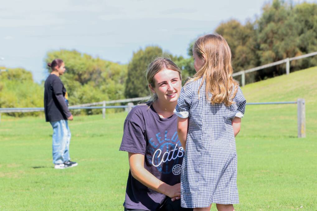 Geelong player Amy McDonald chats to a youngster at the club's Indigenous clinic. Picture by Anthony Brady