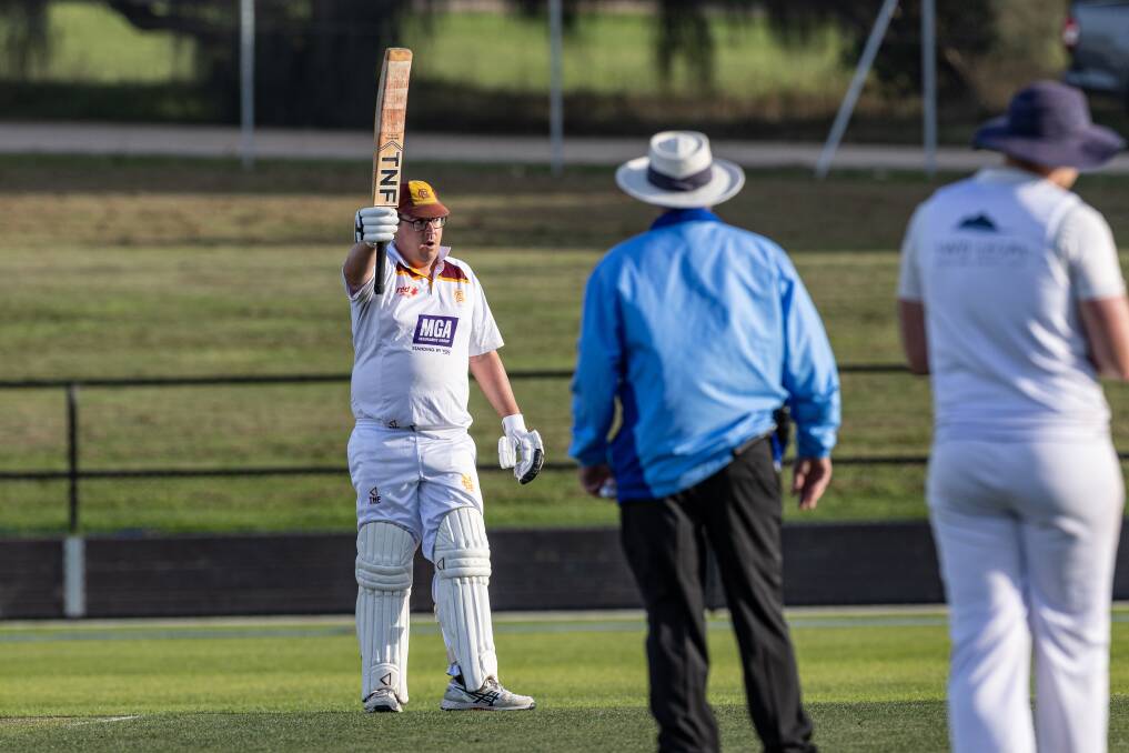 Williams acknowledges the crowd after reaching his century late Saturday afternoon. Picture by Sean McKenna