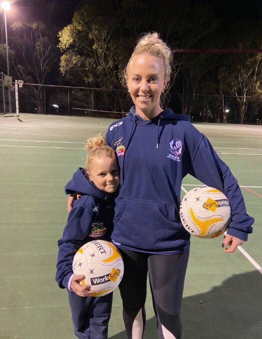 Rose Delaney and daughter Aubree at Nirranda training on Tuesday night.