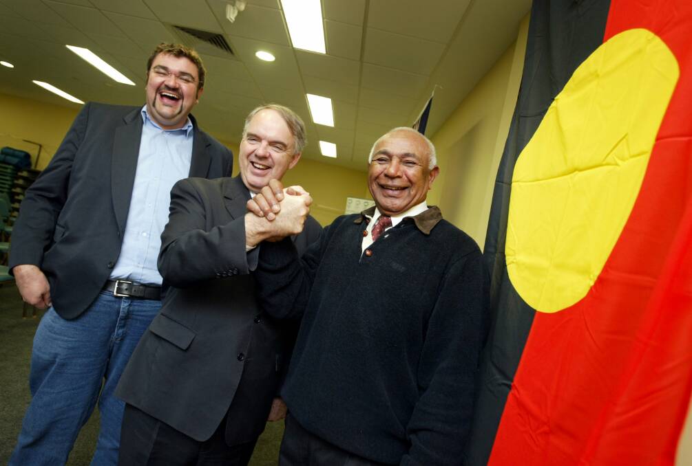 Ken Saunders is announced as patron of the 2006 VAYSAR Football and Netball Carnival in Hamilton. He's pictured alongside then-chairman Damein Bell and former Minister for the Arts and Sport Rod Kemp.