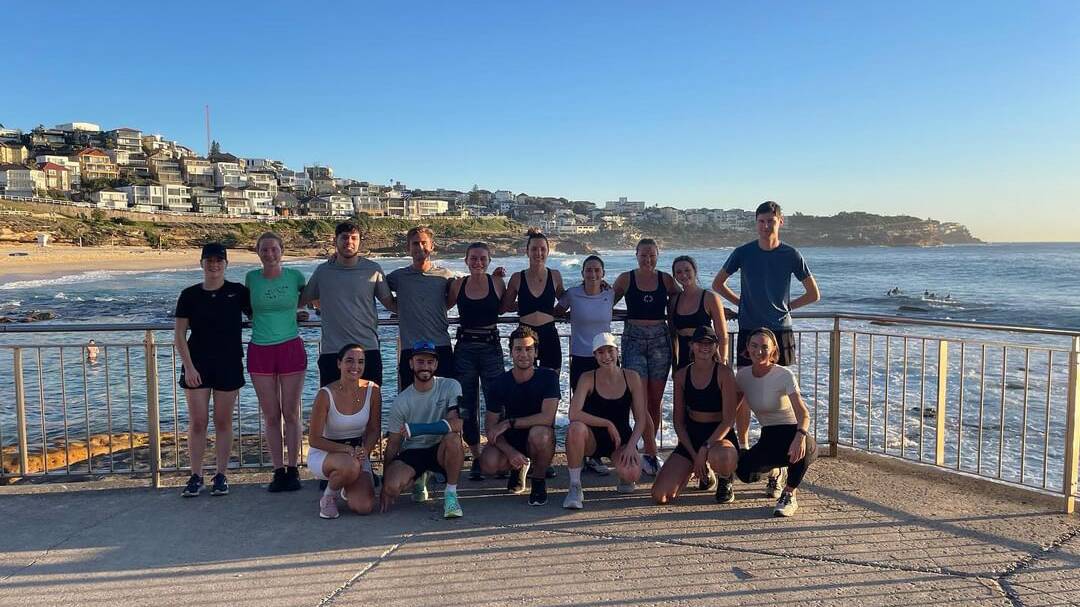 Nat Lawrance (Bottom row, fourth from the left) at her weekly run with the Bondi Beach Run Club. Picture Supplied 