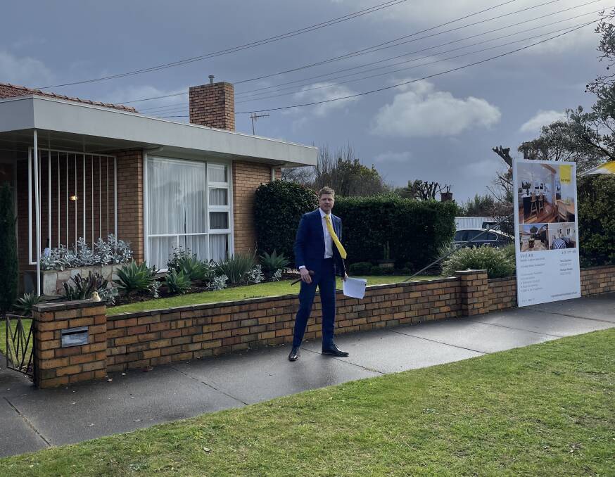 Ray White auctioneer Fergus Torpy at 33 Cramer Street, Warrnambool. The home sold for $665,000. Picture by Rachael Houlihan