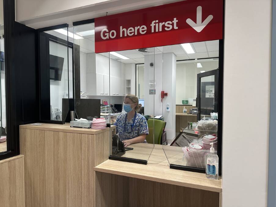 South West Healthcare nurse practitioner Kylie Palmer sits at the new triage station, located in the temporary waiting room at the emergency department.