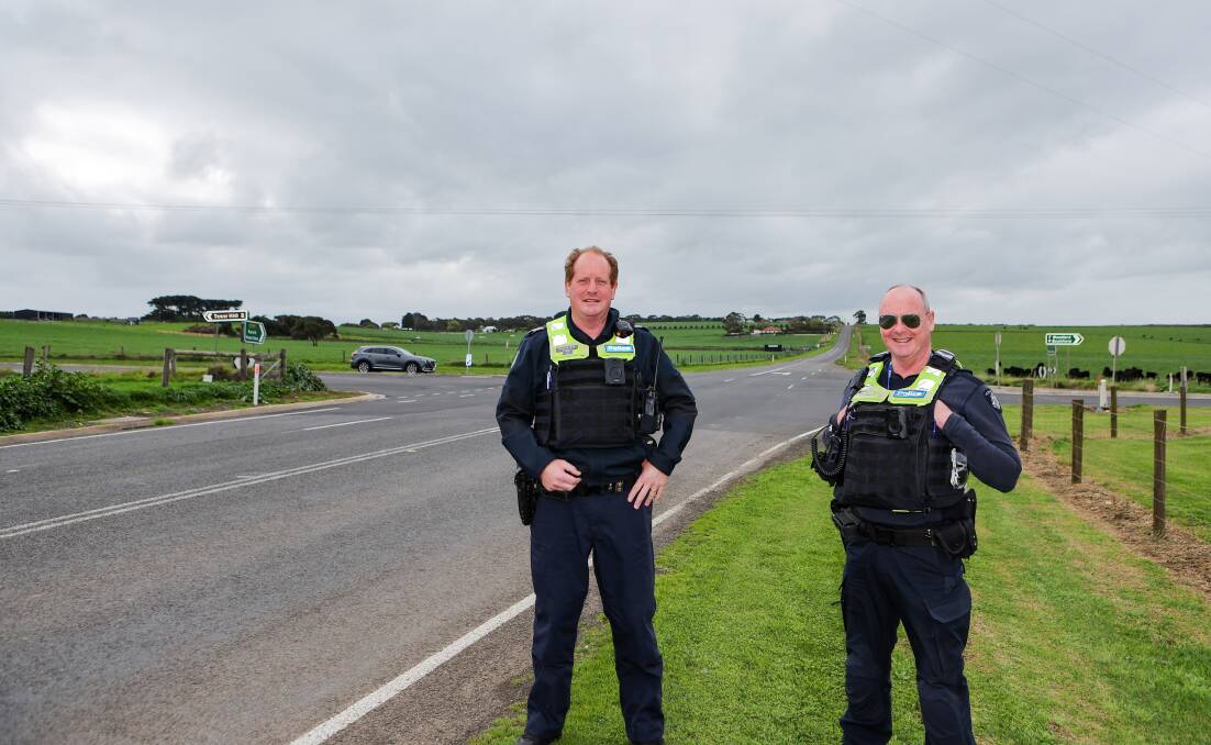 Koroit police Sergeant Pat Day and Leading Senior Constable Chris Kelly are relieved the speed limit had been reduced on the Southern Cross Road near Koroit. Picture by Anthony Brady 